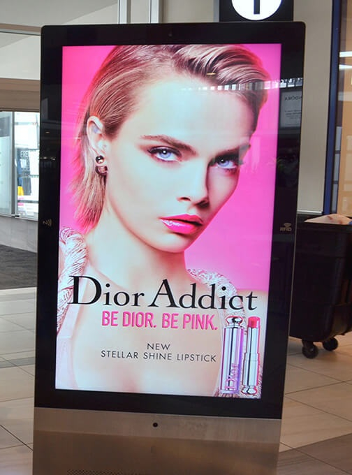 miami-dior-billboard Digital display showing a Dior Addict advertisement for Stellar Shine Lipstick with the tagline 'Be Dior. Be Pink.